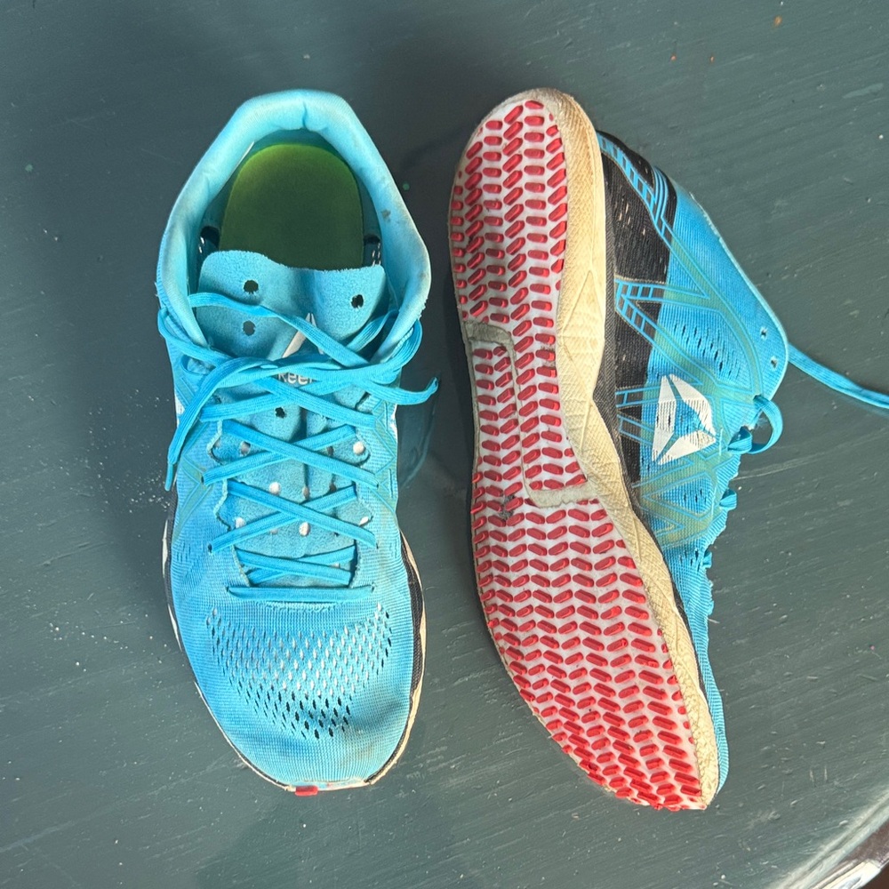 Reebok Men's Blue Athletic Running Shoes with Red Outsoles